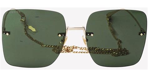 green sunglasses gucci|Gucci rimless shield sunglasses.